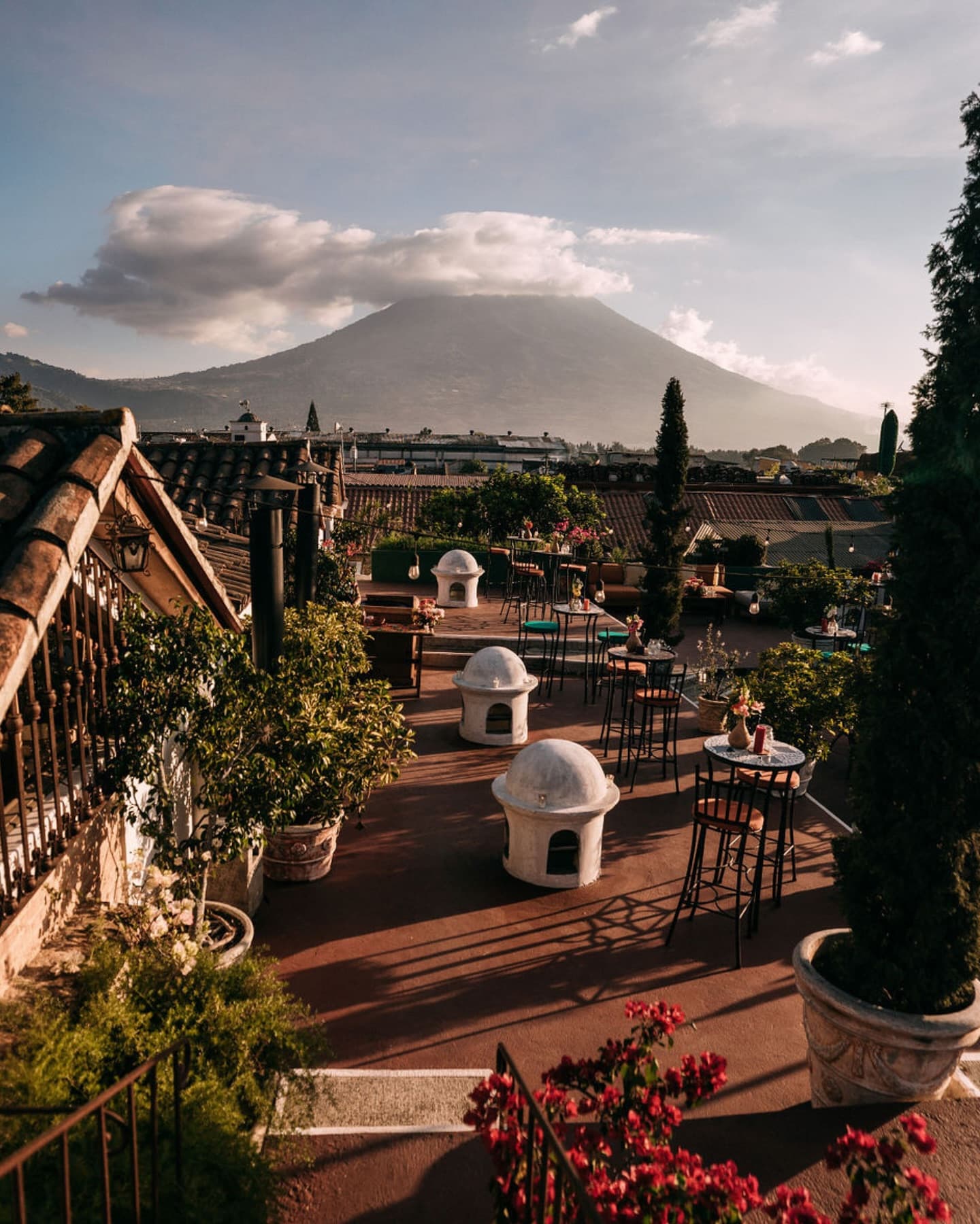 Casa Troccoli's rooftop overlooking the tiled roofs of Antigua and the volcano.
